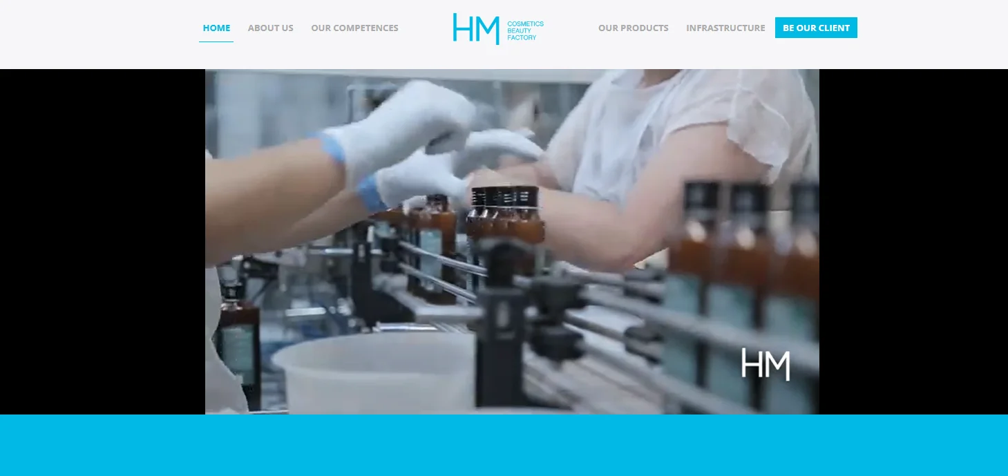 Workers in a cosmetic factory wearing gloves, managing bottles on a production line with branding in the background.